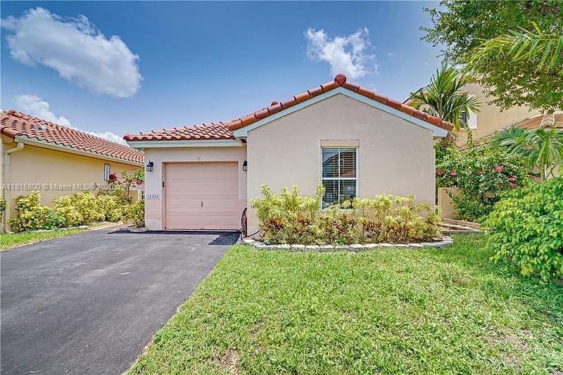 Property for Sale at 18424 Nw 21st St, Pembroke Pines, Miami-Dade County, Florida - Bedrooms: 3 
Bathrooms: 2  - $558,500