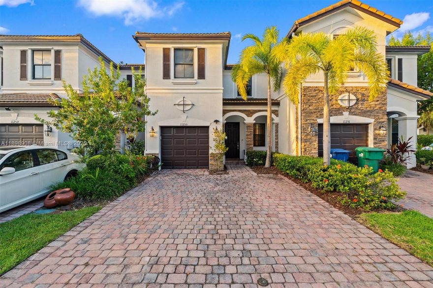 Beautiful two-story Townhouse in the desirable community of Monaco at Doral, featuring 3 bedrooms and 2.5 bathrooms. This home has been completely remodeled with a modern kitchen, quartz countertops, spacious living and dining areas, and a lovely family room with access to the patio — perfect for family gatherings and entertaining. Upstairs you’ll find a convenient laundry area and three large bedrooms, two with walk-in closets, plus two full bathrooms. Includes a one-car garage and space for up to three additional vehicles, equipped with an EV charger. Enjoy the peaceful family-friendly atmosphere of Monaco, ideally located near A+ schools, Legacy Park, and shopping centers. Don’t miss this great opportunity to make this beautiful townhouse your new home!