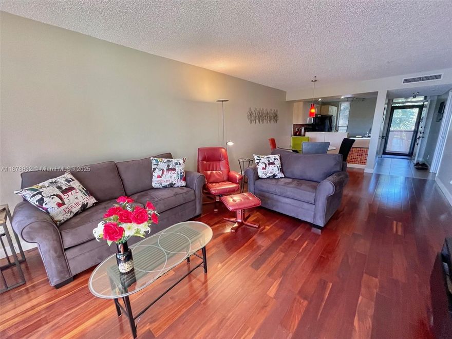 Beautifully remodeled 2/2 with incredible lake views from your spacious living room and primary suite.  Open floor plan.   Large master suite with beautifully renovated bathroom.  Large hurricane proof window in master bedroom.  A/C 2020.  In unit washer & dryer.  Tile and laminate flooring throughout.  Extra storage.  Screened patio overlooking tranquil lake.  Furniture/furnishings included.  Coral Gate is well appointed 55+ community boasting 3 heated pools and 3 clubhouses, walking & biking trails, billiards, gazebo & shuffleboard.  Close to basketball, tennis & pickleball courts.  In close proximity to shopping, restaurants, medical and the Coconut Creek Casino.