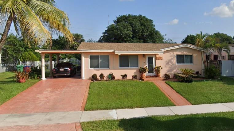 This Lovely home has been totally renovated, home features Two bedrooms ,open floor plan, newly renovated kitchen with wood cabinets and granite countertop, New appliances, tile floor through home. Has has new roof, new hurricane impact windows New A/C. Very large cover patio area across the back of the house has lots of potential. Owner very motivated
