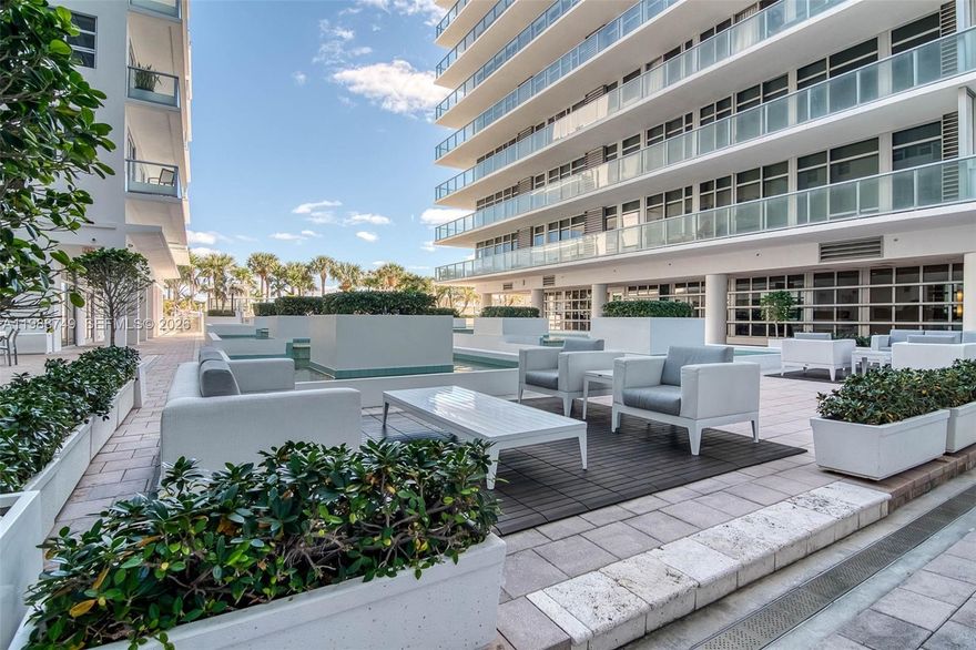 Great Miami Beach condo in exclusive Caribbean Condo South Tower this unit offers a luxurious oceanfront living experience with stunning views and sophisticated design. Wraparound balcony and great Beach Access!