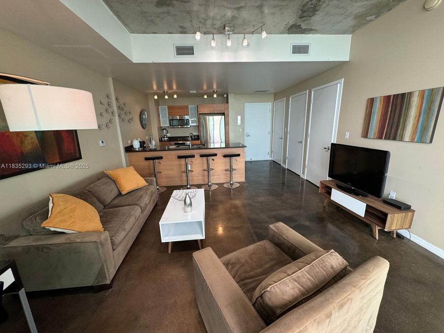 Beautifully appointed studio in the heart of Midtown Miami at Four Midtown. Open floor plan with floor-to-ceiling impact windows, generous balcony, and modern finishes. Enjoy city and partial bay views from this high-floor unit. Italian-style kitchen with stainless steel appliances, spacious bathroom, and in-unit washer/dryer. Midtown 4 offers resort-style amenities including an infinity pool, hot tubs, fitness center, sauna, steam room, and 24-hour concierge. Walking distance to trendy shops, restaurants, and Wynwood Arts District.