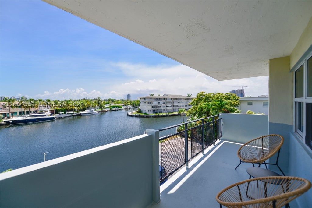 Photo of 401 Golden Isles Dr #312, Hallandale Beach, FL 33009 (MLS # A12064389)