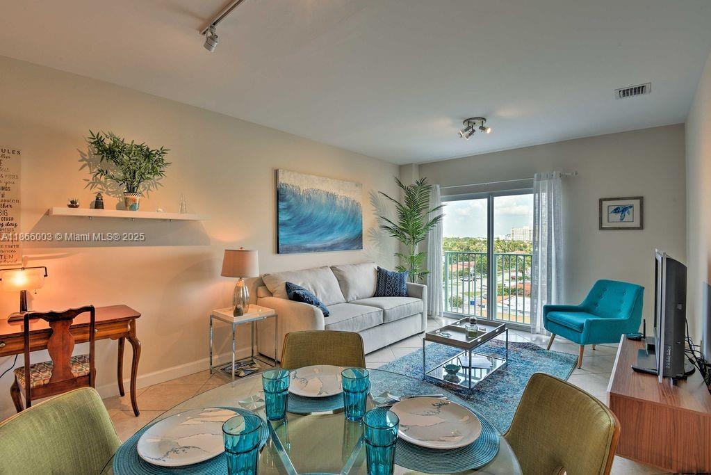 Cozy apartment centrally located with easy access to Coral Gables, The Grove, and Brickell. 1 bedroom, 1 bath. Fully equipped kitchen with stainless steel appliances and granite countertop. In-unit washer/dryer, spacious laundry closet w/storage, and updated AC. Enjoy skyline views of Coral Gables and surrounding areas. Immaculately maintained, safe & gated Building with 24/7 security. 1 assigned parking space. Pet-friendly. Walk to restaurants, boutique shops, nightlife, supermarkets, Miracle Mile, Coral Gables, and nearby parks. Minutes from MIA Airport, Brickell, Downtown Miami, Coconut Grove, the University of Miami, top hospitals, and major highways including I-95 & 836. Seasonal and short term rentals allowed making this an ideal investment as well. Vacant & ready for move-in.