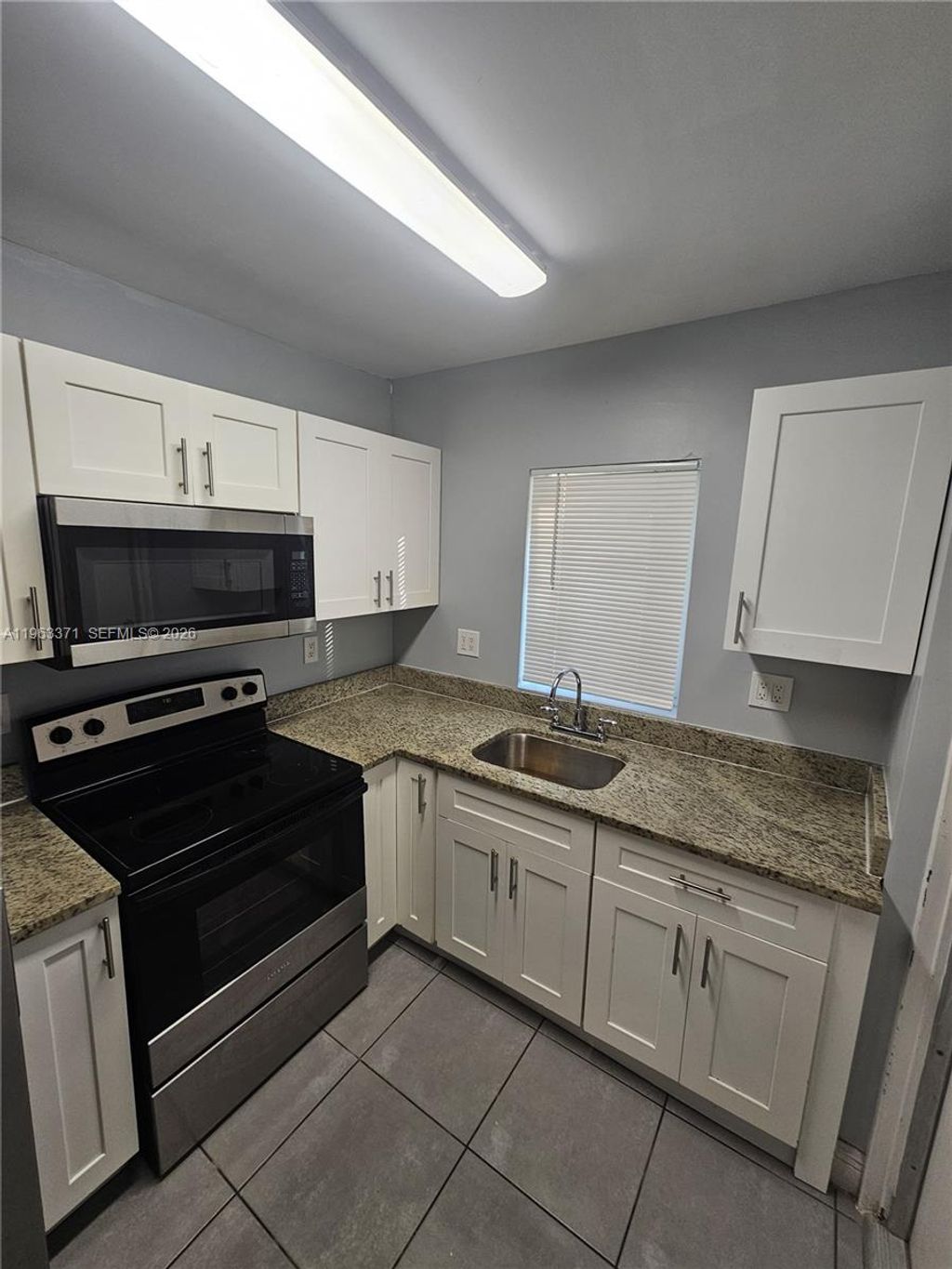 Photo of 1128 NW 101st St, Miami, FL 33150 (MLS # A11963371)