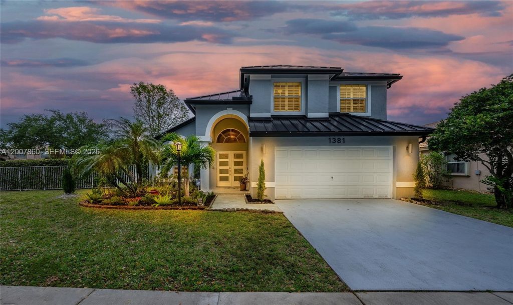 Photo of 1381 NW 144th Ave, Pembroke Pines, FL 33028 (MLS # A12007860)