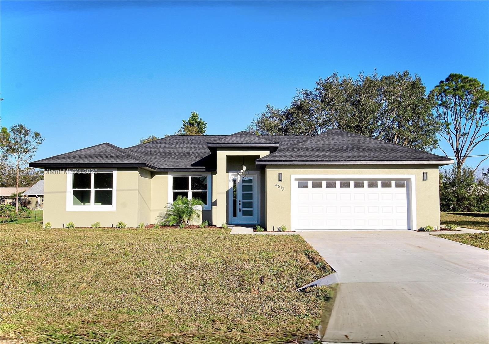 Beautifully designed 3-bed, 3-bath home with premium upgrades and modern style throughout. Features include open-concept layout, Wi-Fi ceiling fan, backlit/defogging mirrors, elegant tilework, granite countertops, and stylish backsplash. Kitchen includes brand-new Whirlpool appliances. Enjoy a covered lanai with ceiling fan, spacious backyard, and 4-zone irrigation system. Extras: utility sink, oversized 2-car garage with attic ladder, and French doors with built-in blinds. Move-in ready—schedule your showing today!
