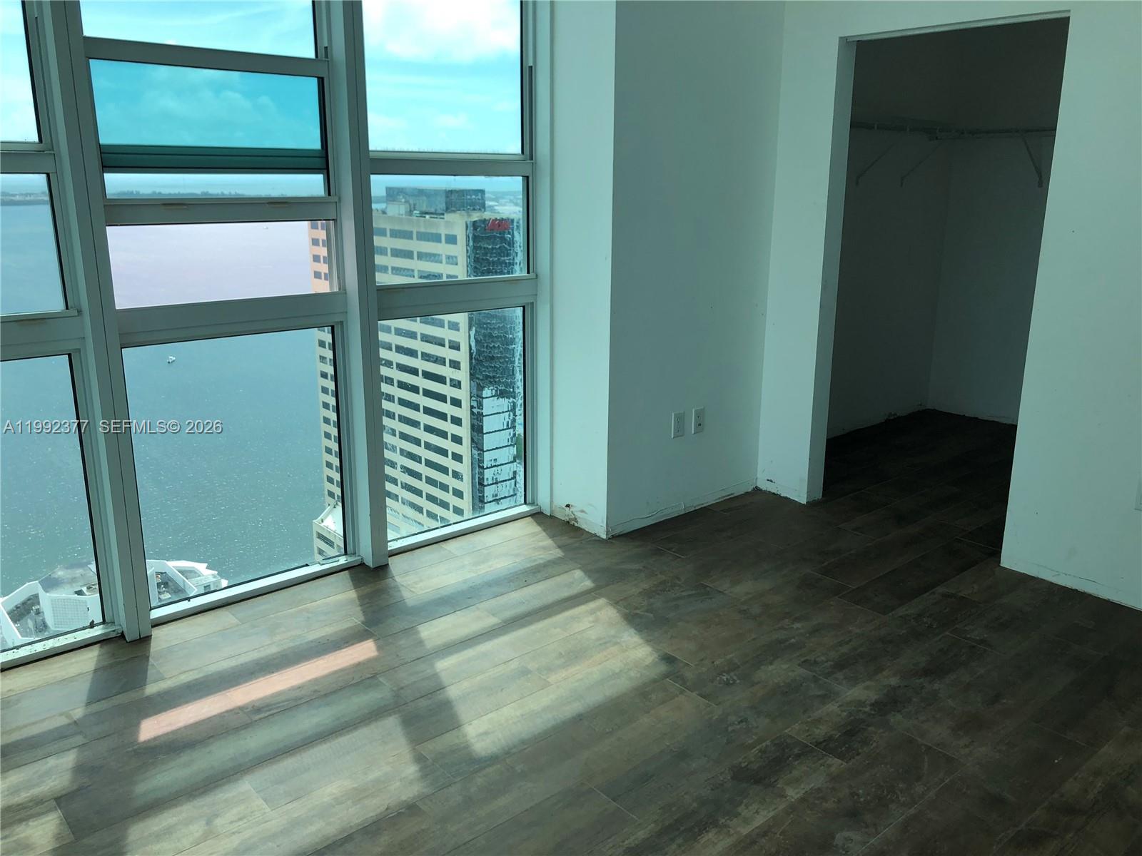 THE PLAZA 901 BRICKELL CO - Residential Lease