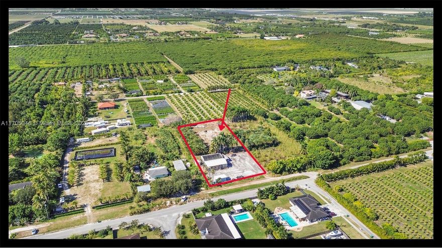 Ready to own a slice of paradise. Located in one of the most desirable neighborhoods in Homestead.  You can either build new home or grow your crops.  This 1.5-acre vacant, that comes with a green house, new septic tank with a Lift station, updated irrigation system and pump,  RV trailer not include and Storage 12x20 NOT included with the sale. Main entrance is on paved road, and chain link fence providing added security.  The lot is surrounded by new construction homes. The property is grandfathered in and meets the minimum zoning requirements for the construction of a single-family home.  Property includes approximately 8 Royal Palms, 80 Canary Island Date Palms, Agricultural License available for sale with over 25 in business.