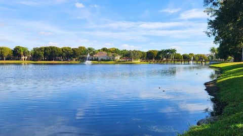 Photo of 2557 Centergate Dr #101, Miramar, FL 33025 (MLS # A11924981)