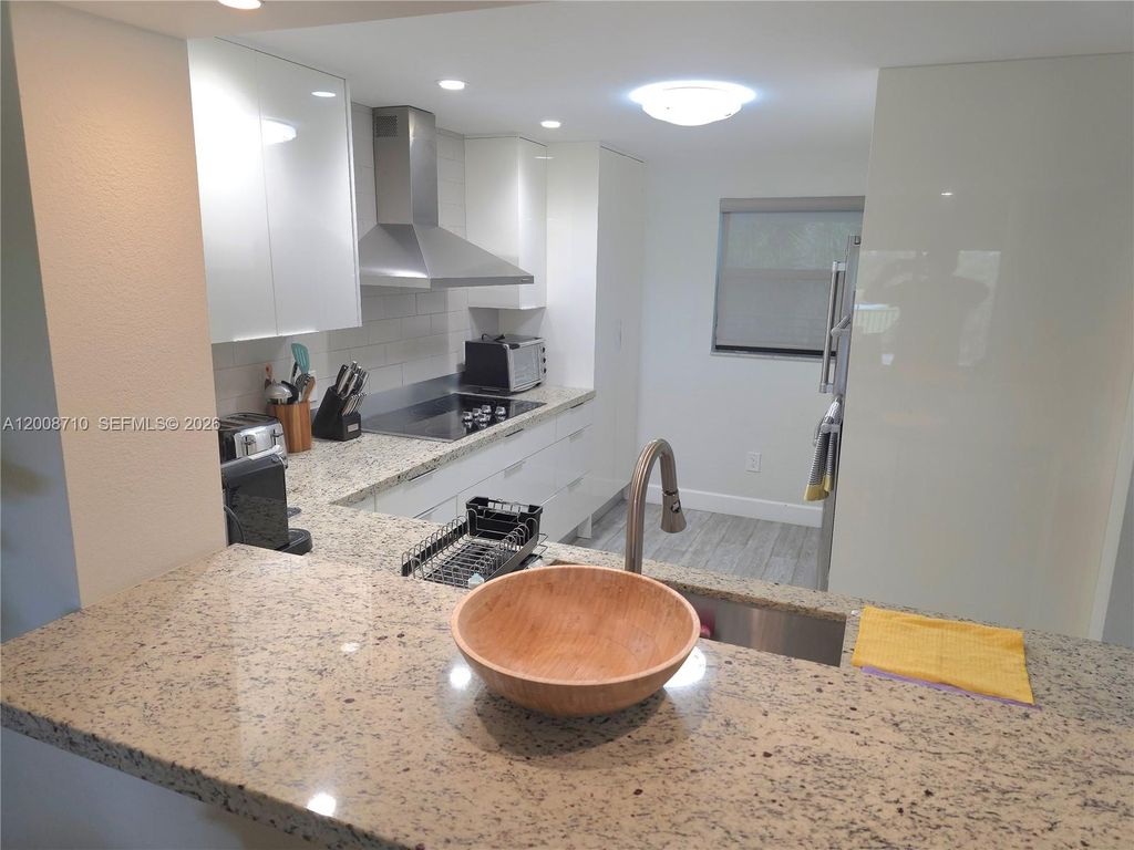 Photo of 16171 Blatt Blvd #302, Weston, FL 33326 (MLS # A12008710)
