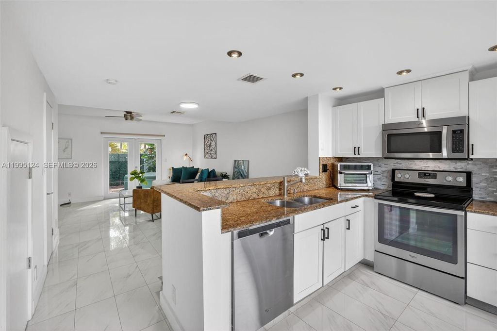 Photo of 1953 NE 15th Ave #1953, Fort Lauderdale, FL 33305 (MLS # A11995124)