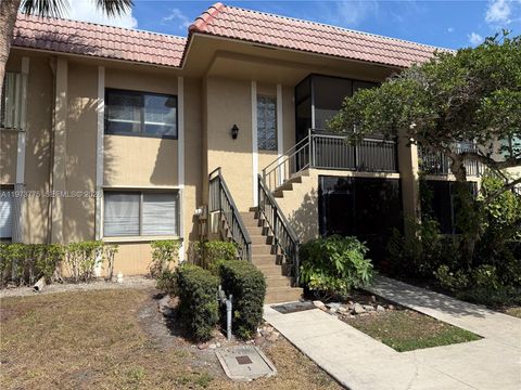 Photo of 302 Lakeview Dr #204, Weston, FL 33326 (MLS # A11973775)