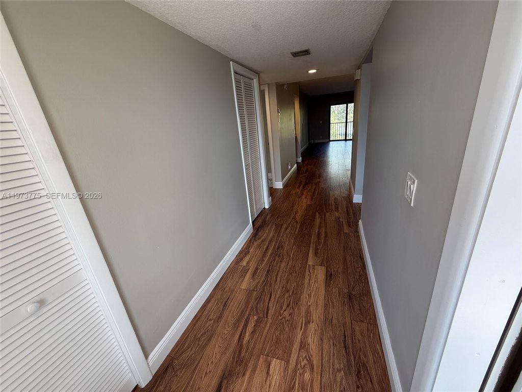 Photo of 302 Lakeview Dr #204, Weston, FL 33326 (MLS # A11973775)