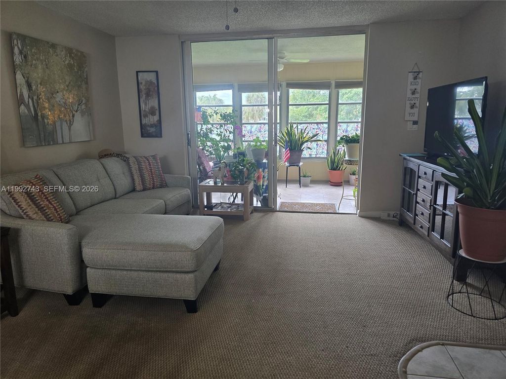 Photo of 7664 NW 18th St #204, Margate, FL 33063 (MLS # A11992743)