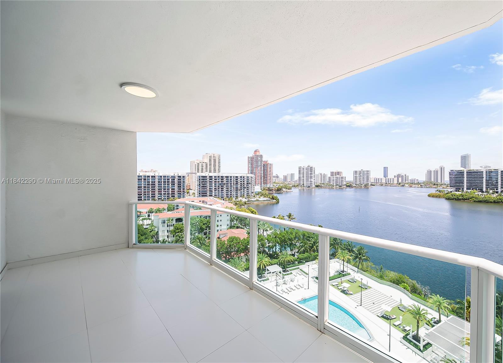 LUXURIOUS WATERFRONT LIFESTYLE – ELEGANT 3 BEDROOM, 3.5 BATH + DEN WITH WHITE CRYSTAL FLOORS AND CUSTOM CLOSETS. PANORAMIC BAY & OCEAN VIEWS FROM A MODERN, BRIGHT LAYOUT. LOCATED IN THE PRESTIGIOUS PENINSULA, NEXT TO ICONIC WILLIAMS ISLAND. RESORT-STYLE AMENITIES: CONCIERGE, SPA, GYM, TENNIS & MORE. WALKING DISTANCE TO HOUSE OF WORSHIP!