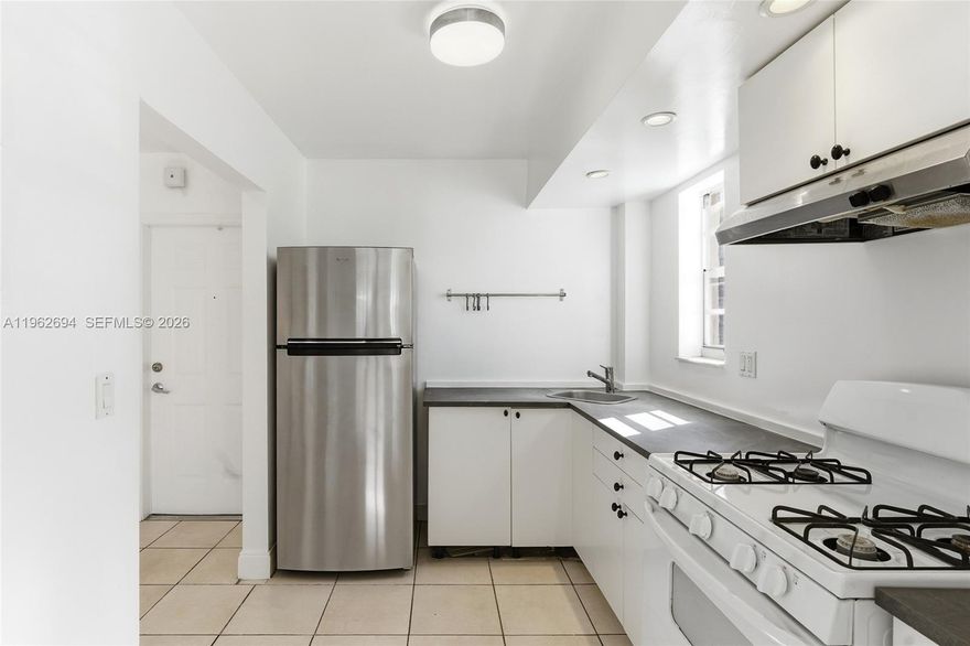 Spacious First-floor corner unit in Pinecrest Villas! This inviting condo features a functional layout with the kitchen opening seamlessly to the dining and living areas, creating an easy flow for everyday living and entertaining. A spacious private patio extends directly off the family room, perfect for relaxing or hosting guests. The community offers a swimming pool, communal laundry facilities (no washer/dryer in unit), and expansive green spaces throughout. Ideally located directly across from Gulliver Prep and within walking distance to Dadeland, with convenient access to shopping, dining, and major roadways. A great opportunity to own in one of Pinecrest’s most desirable locations.