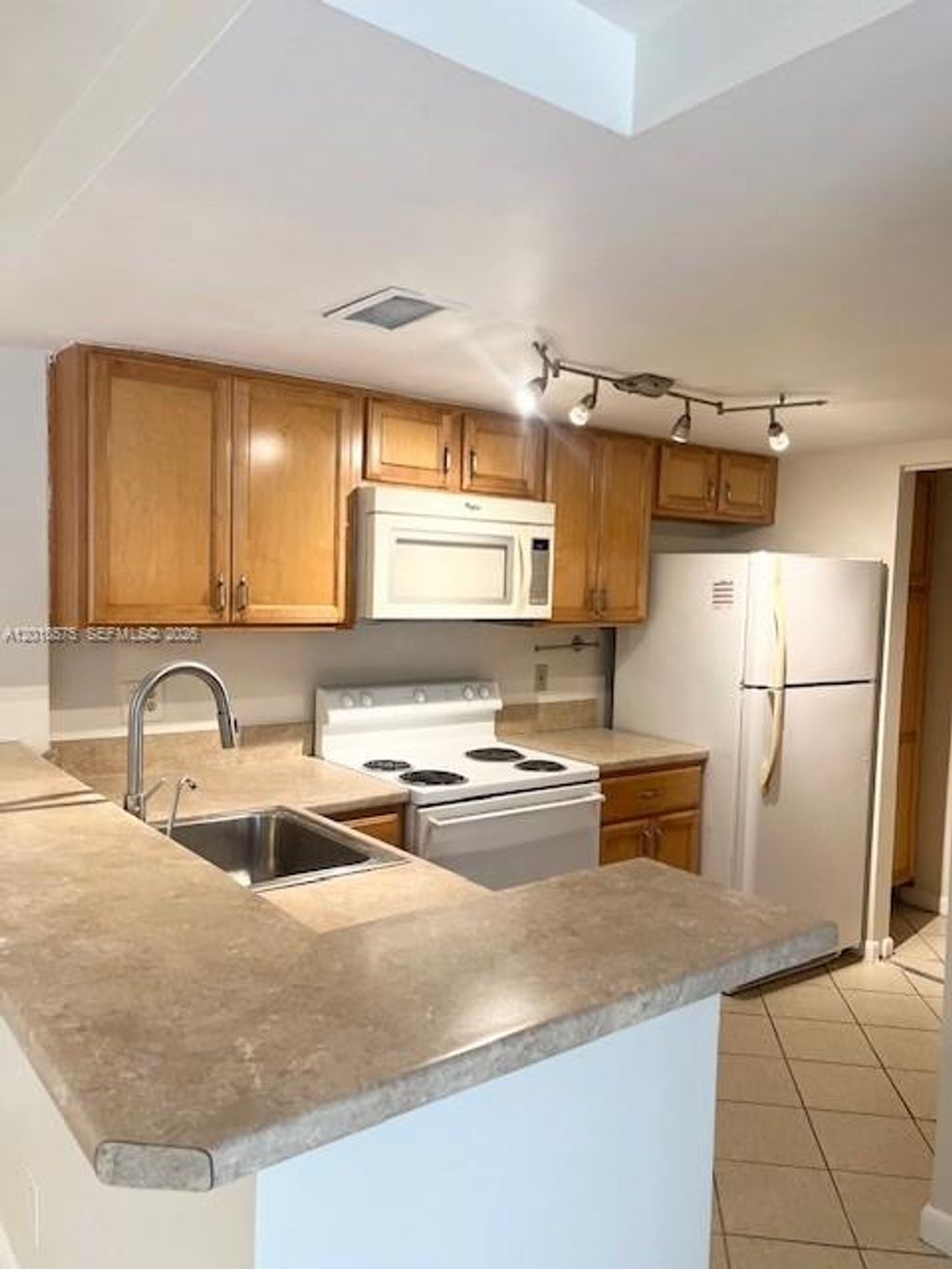 Photo of 10709 Cleary Blvd #105, Plantation, FL 33324 (MLS # A12018575)