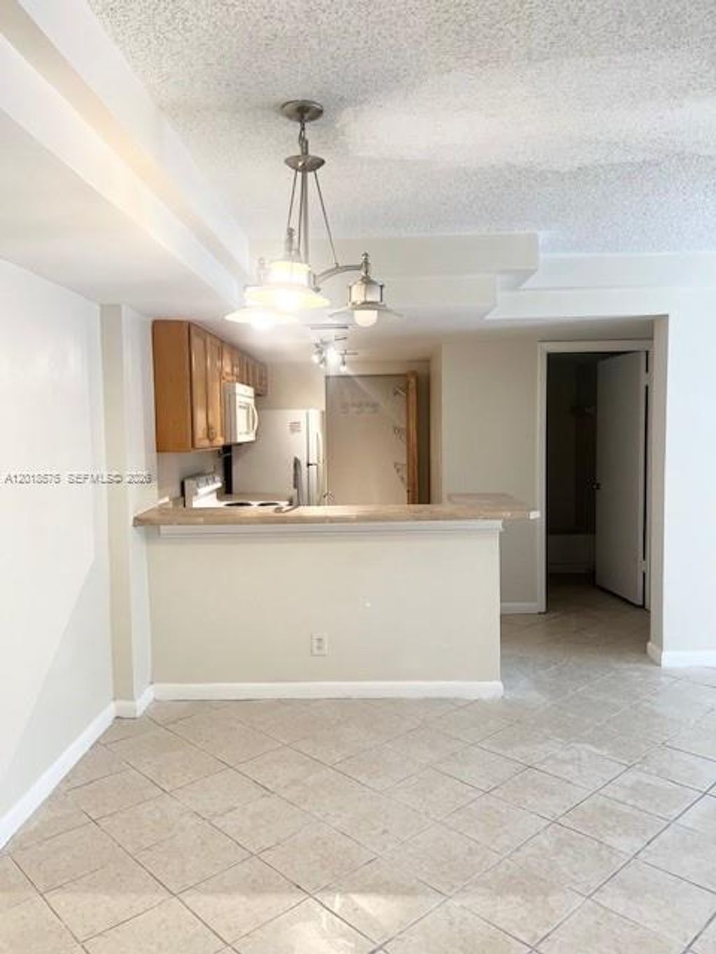 Photo of 10709 Cleary Blvd #105, Plantation, FL 33324 (MLS # A12018575)