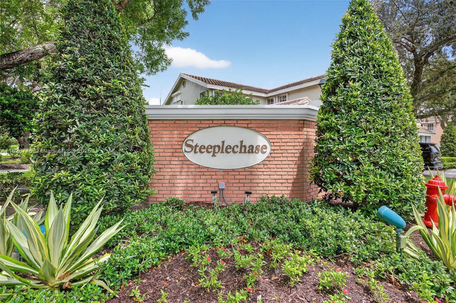 IMMACULATE 3 BR/2 BA condo in prestigious GATED COMMUNITY of Steeplechase at Eagle Trace. LARGE light & bright Living & Dining area w/VAULTED CEILINGS. Balcony access from the Living Rm. OVERSIZED Kitchen with SS appliances, DOUBLE Convection wall ovens, granite counters, & breakfast area. Updated flooring throughout. SPACIOUS Primary Bedroom w/2 Walk-in Closets. GORGEOUS UPDATED PRIMARY BATH; Dual Vanity with LED Mirrors, Garden Tub, & frameless glass Shower. UPDATED GUEST BATH. ROOF 2006, WATER HEATER 2016, HVAC 2010. Additional FRIDGE IN GARAGE! GENERATOR INCLUDED! FULL ACCORDION SHUTTERS. Maintenance fee covers reserves, roof, paint, pool, exterior, water/sewer, & trash. Enjoy amenities: 24-hr guard gate, clubhouse, gym, tennis, pickleball, & playground. Optional Golf. Pet-friendly!