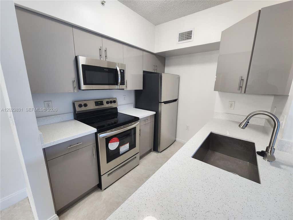 Photo of 11715 W Atlantic Blvd #1826, Coral Springs, FL 33071 (MLS # A12023831)