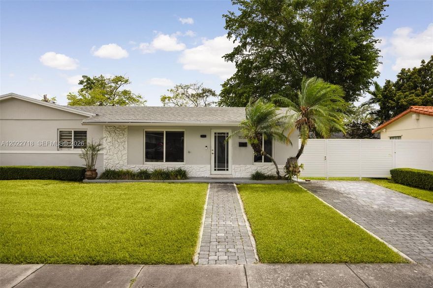 A spacious corner-lot residence offering comfort, privacy, and everyday functionality in a central Miami location. This one-story home features 3 bedrooms, 1 bath, and expansive living areas filled with natural light. Tile flooring runs throughout, while the generous family room provides flexible space for relaxing or entertaining. Impact glass windows and doors enhance both style and peace of mind, while the screened porch opens to a large fenced backyard with mature landscaping and a detached shed ideal for additional storage or workspace. Situated on an 8,400 SF lot, the property also offers ample driveway parking and a functional layout designed for easy living. Conveniently located near major roadways, shopping, dining, parks, and local schools, this home presents an excellent opportunity in an established Miami neighborhood.