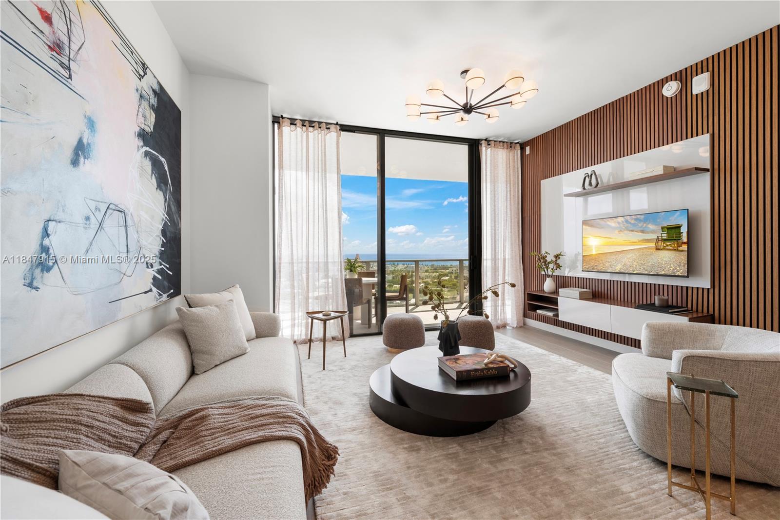 This elegantly designed 1 bed 1.5 bath residence at Five Park offers a refined blend of comfort, style, and functionality. Enjoy the sweeping views of the Atlantic Ocean and vibrant South Beach from the oversized terrace. Floor-to-ceiling windows, 10 ft ceilings and an open-concept layout enhance the sense of space. The gourmet kitchen features Gaggenau appliances, white oak cabinetry, and quartzite countertops. The primary bath features marble floors/ wall/ vanity top. Delivered November 2024, Five Park, the newest luxury landmark in Miami Beach, offers its residents an elevated lifestyle, including access to exclusive amenities, such as a Bay-facing full-service pool deck, a state of the art gym and wellness spa, and private beach club. Developer inventory, other units available.
