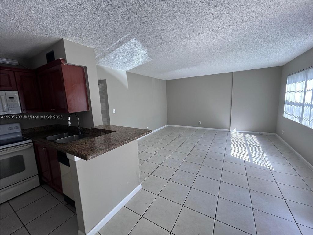 Photo of 11481 NW 42nd St #11481, Coral Springs, FL 33065 (MLS # A11905703)