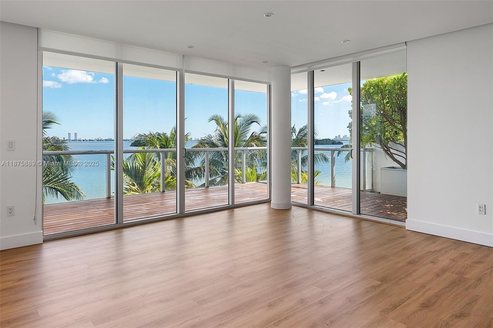 Nothing compares to this stunning bayfront corner residence at IOS on the Bay, offering 1,800 sq. ft. of combined indoor and outdoor living. Located in Miami’s historic MiMo District within the Upper East Side, this rare home is one of only five direct bayfront 2-bedroom, 2.5-bath units in the building. The spacious corner layout features wood floors, an oversized primary suite, and a spa-style bath with a steam shower. IOS on the Bay is an exclusive 43-residence boutique condominium with on-site management, a bayfront pool, fitness center, and direct water access—ideally positioned between Morningside Park, Belle Meade, and just minutes from Miami Shores.