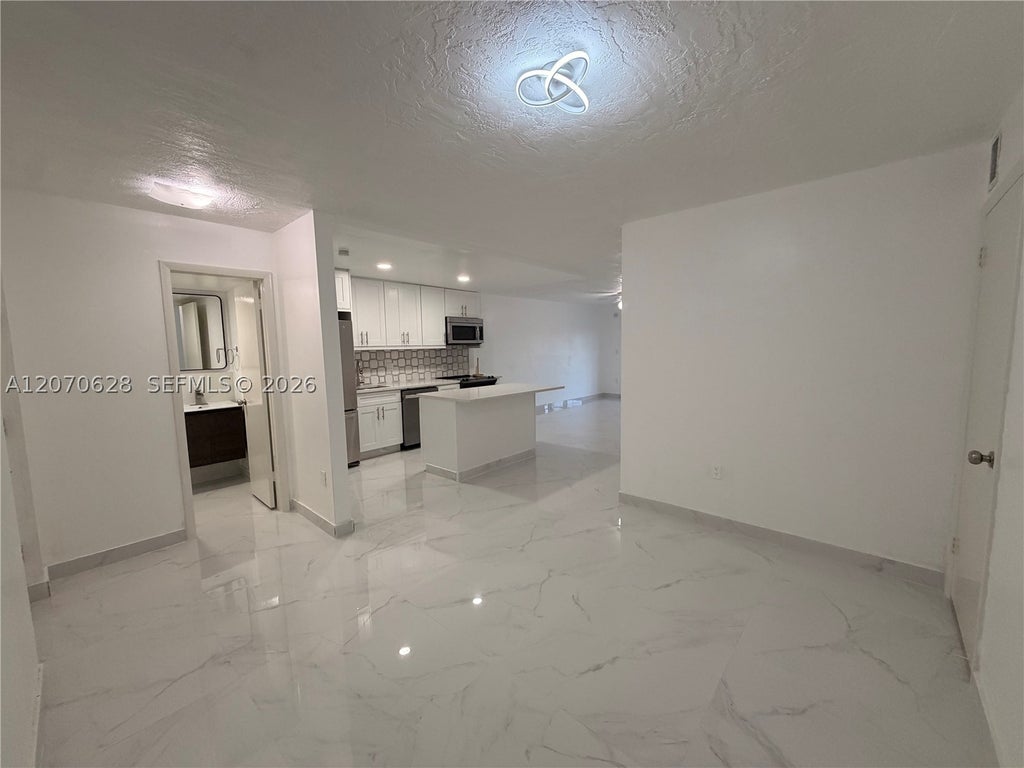 Photo of 7000 NW 17th St #320, Plantation, FL 33313 (MLS # A12070628)