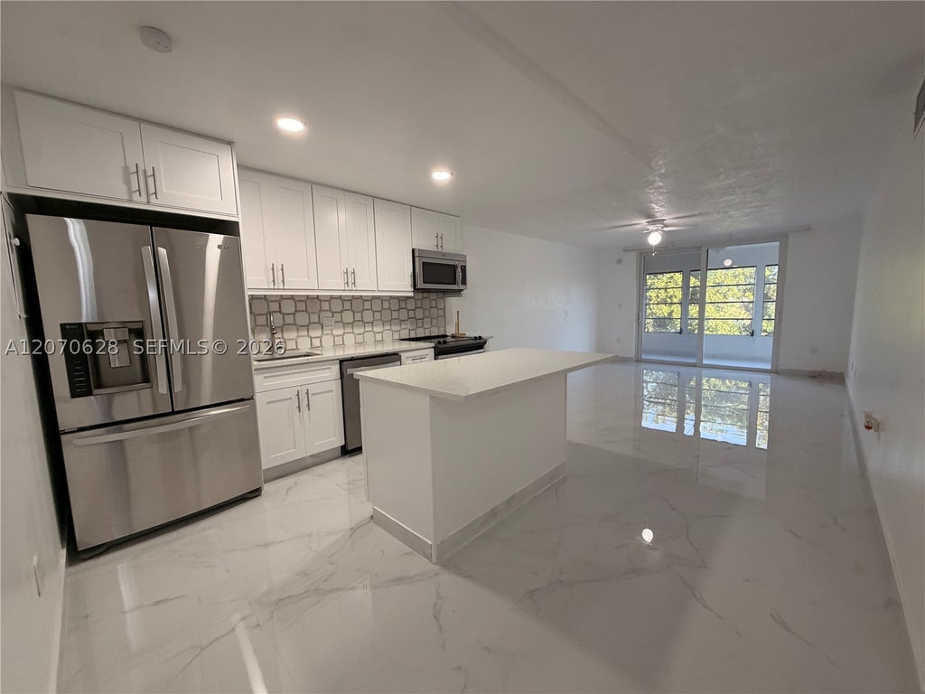 Photo of 7000 NW 17th St #320, Plantation, FL 33313 (MLS # A12070628)