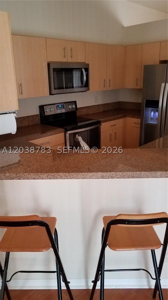 Photo of 1440 Canary Island Dr #1440, Weston, FL 33327 (MLS # A12038783)