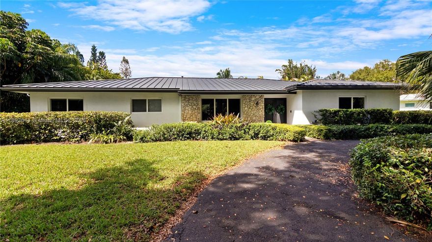 Lush 4BR/2BA home in North Palmetto Bay, just minutes from Pinecrest and 5 minute walk to Coral Reef Park. This Home on a 17,400+ sq ft lot & offers 2,800+ sq ft of living space with a modern kitchen, upgraded baths, and an open floor plan. Enjoy a screened-in pool, covered terrace, and enjoy the convenience of a TWO-car garage PLUS storage room. Features a brand-new aluminum metal roof and two newer A/C units. Prime location near top schools, parks, and shops — a true Palmetto Bay gem!