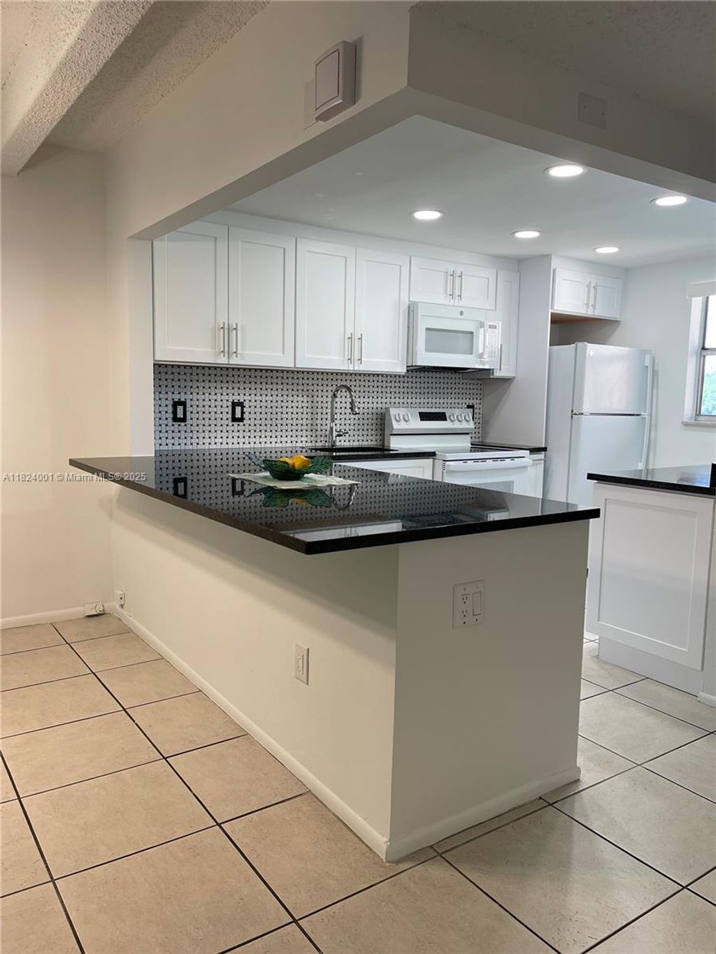 Photo of 10110 Boca Entrada Blvd #301, Boca Raton, FL 33428 (MLS # A11824001)