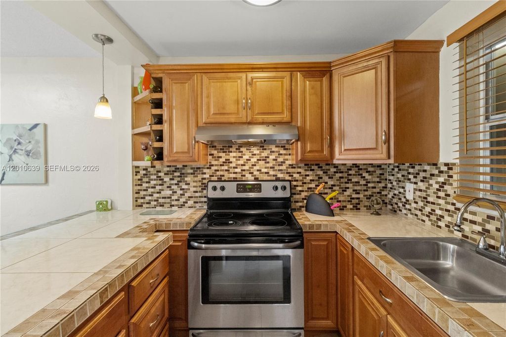 Photo of 2600 Diana Dr #119, Hallandale Beach, FL 33009 (MLS # A12010639)