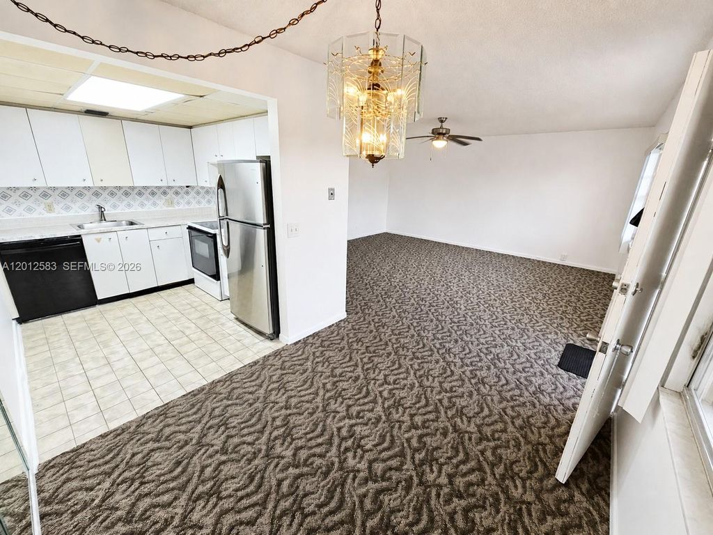 Photo of 13250 SW 7th Ct #402L, Pembroke Pines, FL 33027 (MLS # A12012583)