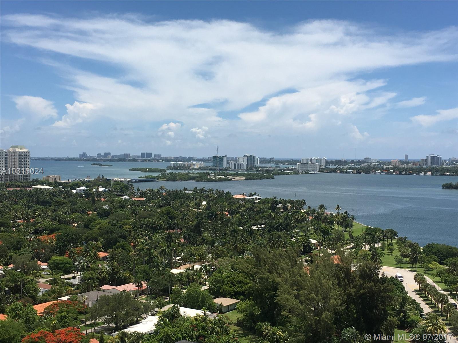 Exquisite views from this spacious and highly sought after corner unit in iconic Palm Bay Yacht Club. Updated bathrooms and kitchen with SS appliances, granite countertops and washer/dryer in unit. This premier building in Upper Eastside/MIMO has 4 tennis courts, fully equipped gym & sauna, lobby bar, convenience store, valet and one assigned covered parking space.