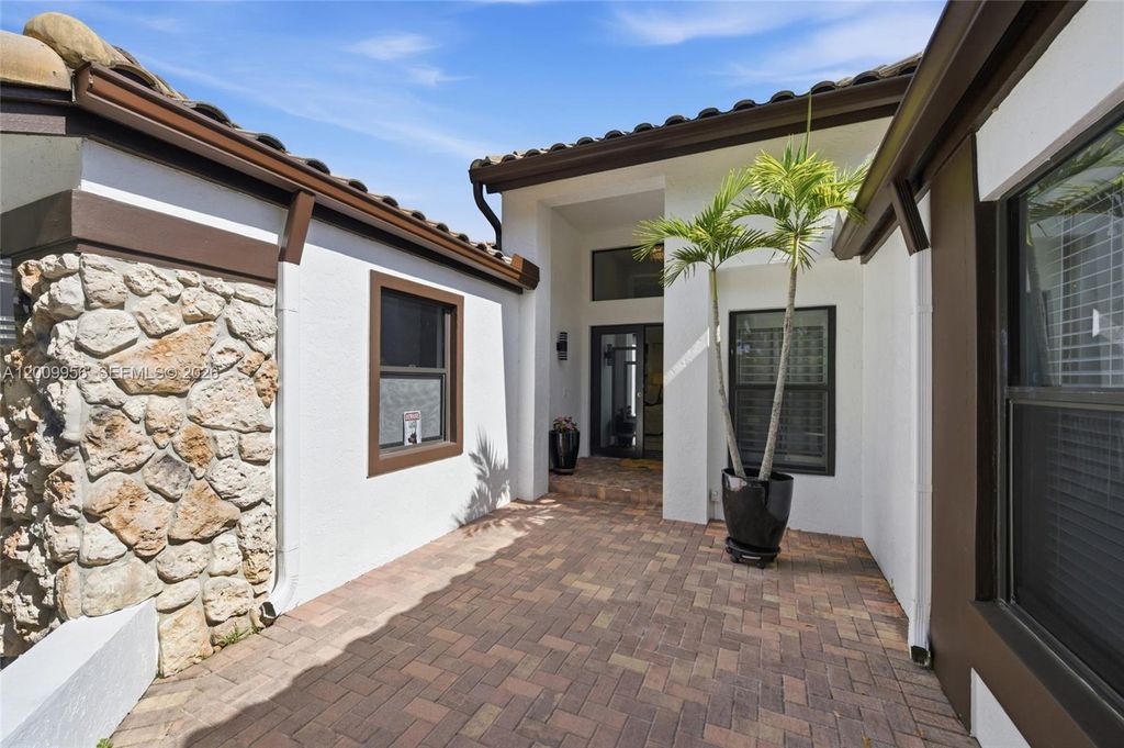 Photo of 10781 NW 18th Dr, Plantation, FL 33322 (MLS # A12009956)