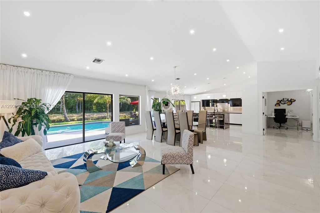 Photo of 10781 NW 18th Dr, Plantation, FL 33322 (MLS # A12009956)