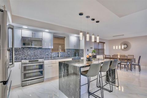 Photo of 605 Ives Dairy Rd #305-7, Miami, FL 33179 (MLS # A11995079)