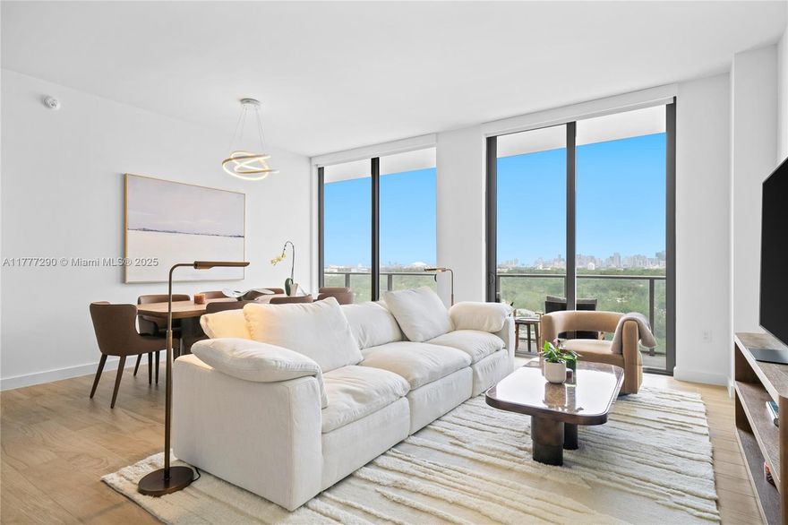 Refined living at Mr. C Tigertail! Residence #1002B is a 3-bed, 3.5-bath corner unit with a 438-sq-ft wrap-around terrace offering breathtaking Coconut Grove & Brickell views. Unlike other units, this one is fully turn-key with custom California Closets and automated Shade Store blinds already installed. Designed by Meyer Davis, it features an ItalKraft kitchen, Sub-Zero/Wolf appliances, and quartz countertops. Enjoy a rooftop pool, garden lap pool, fitness center with yoga & Pilates, and valet-serviced parking with two spaces included.