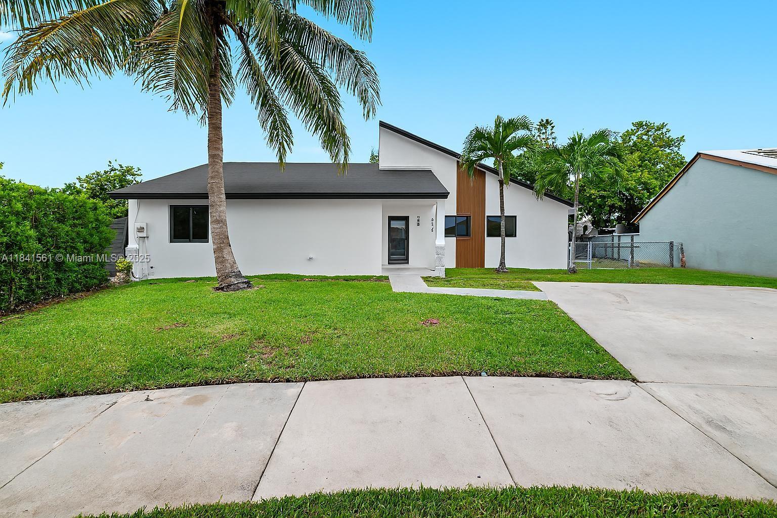 This beautifully REMODELED home is the perfect blend of modern elegance and comfort. Step inside to discover BRAND-NEW flooring throughout, a COMPLETELY REDESIGNED kitchen with sleek cabinetry and finishes, and high-end bathrooms that exude sophistication. NEW impact windows and doors have been installed for added safety, efficiency, and peace of mind. Fresh interior and exterior paint, updated lighting throughout, and a 2022 AC handler ensure a move-in-ready experience. Beyond the home’s stunning interior, you have space for a boat and enjoy a prime location just minutes from popular attractions like the zoo, Tropical Park, shops, restaurants, & entertainment. Whether you're relaxing at home or exploring all that the area has to offer, this property delivers exceptional value & lifestyle.