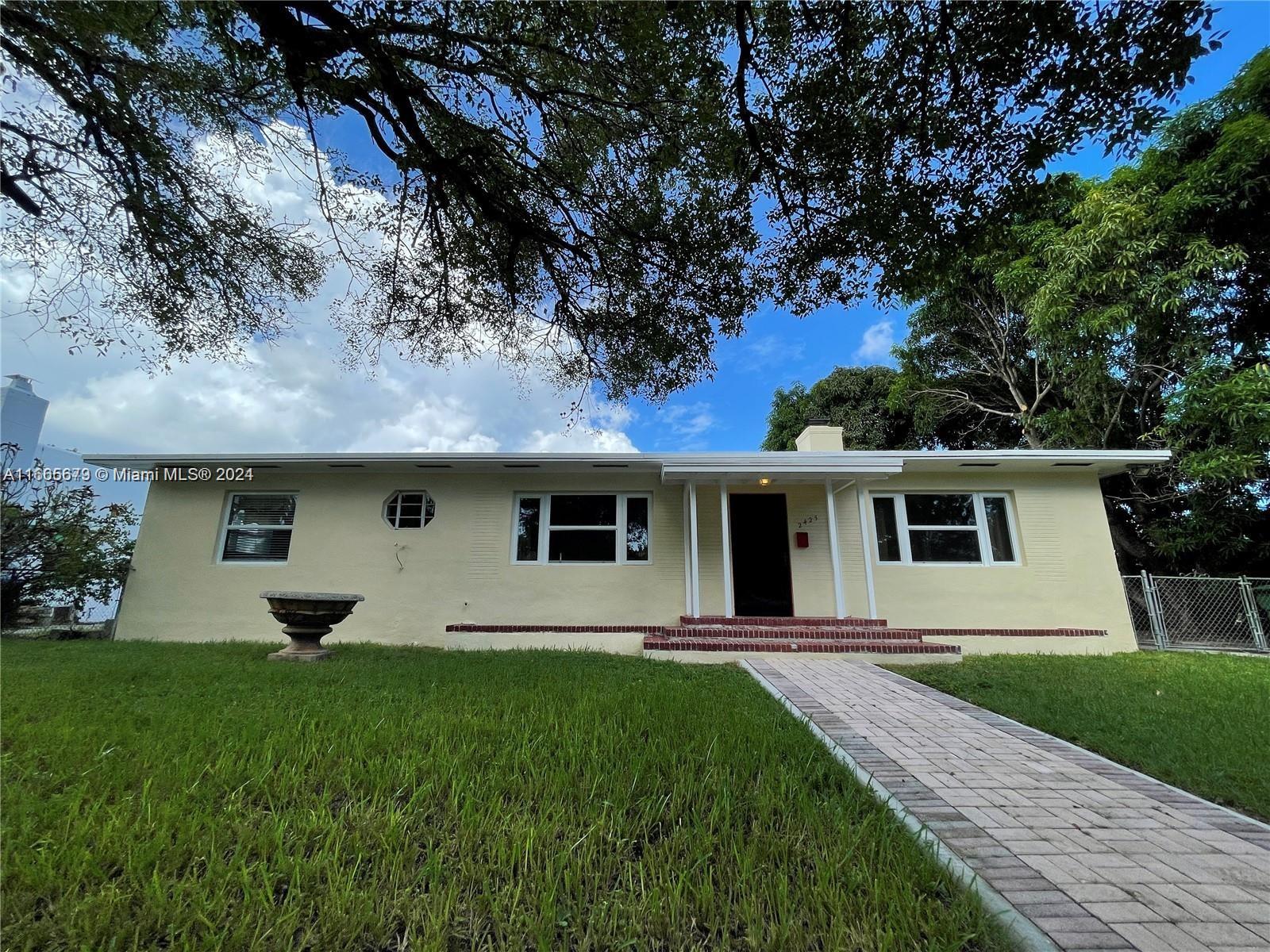 Great opportunity to lease a 2/2 house with a detached 1/1 cottage on a huge lot, in a fantastic location, on a lovely tree lined street. The main house features a chef's kitchen complete with double size fridge, separate freezer, wine cooler and rack, induction stove with built in water faucet, and double oven . The main house also features a large master bedroom, beautiful large format tile floors, impact windows, renovated bathrooms, lots of closet space, washer/dryer, and large concrete patio in rear. The 1/1 cottage is updated as well, it includes a full kitchen, bedroom, living room, its own washer/dryer, and walk in closet. The lot is very large at 13,800 sqft and has multiple mango trees. No pets allowed.