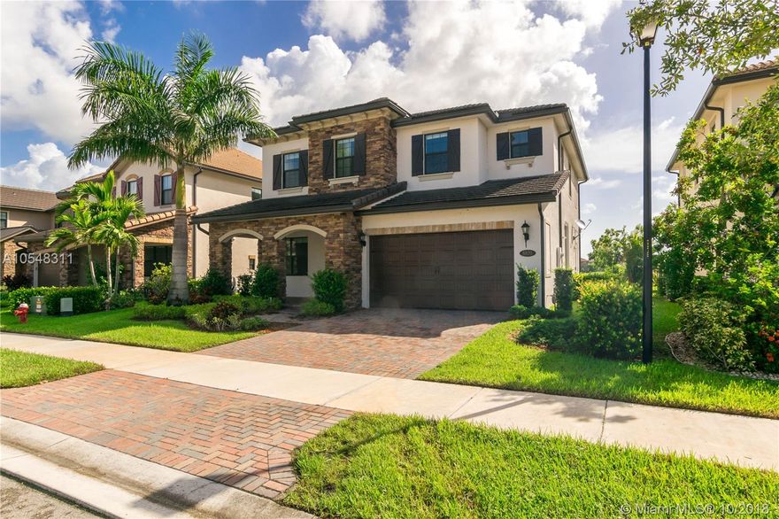 MOVE FAST on this Beautiful 5 bedroom/ 4 full bath home that awaits a lovely family. It features a fabulous open concept layout. The gourmet kitchen steals the show with state of the art stainless steel appliances, an island counter top and recessed lighting. This stunning house has one bedroom and full bath downstairs, a junior suite upstairs plus a lush master suite. In addition, it has a media room. Home features impact windows throughout. Enjoy the serene and tranquil living offered at Watercrest; Exclusive gated community that offers hotel resort style clubhouse with swimming pool, huge lake with dock and water sports, gym, tennis, basketball, fit trail, kids playground and more. Your buyer will fall in love with this home. HURRY!!!