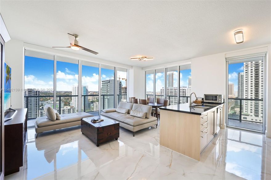 Very desirable, recently renovated CORNER UNIT!! Bright 2/2 condo with floor to ceiling windows and amazing views. Modern kitchen with quartz counters and stainless steel appliances.  Split bedroom floor plan with a wrap around balcony with access to all rooms. Renovation upgrades include custom designed closets, brand new fixtures throughout, motorized remote controlled custom shades and blackout blinds, remote controlled ceiling fans, LED lighting, and cosmetic upgrades in the bathrooms.  Includes one dedicated parking space. Located in the heart of Brickell only steps from the Metrorail and Mary Brickell Village. 24 hr security, high end amenities including two pools, fitness center, party room, play area, business center and kids playroom.  Perfect to live in or for Investors to rent!