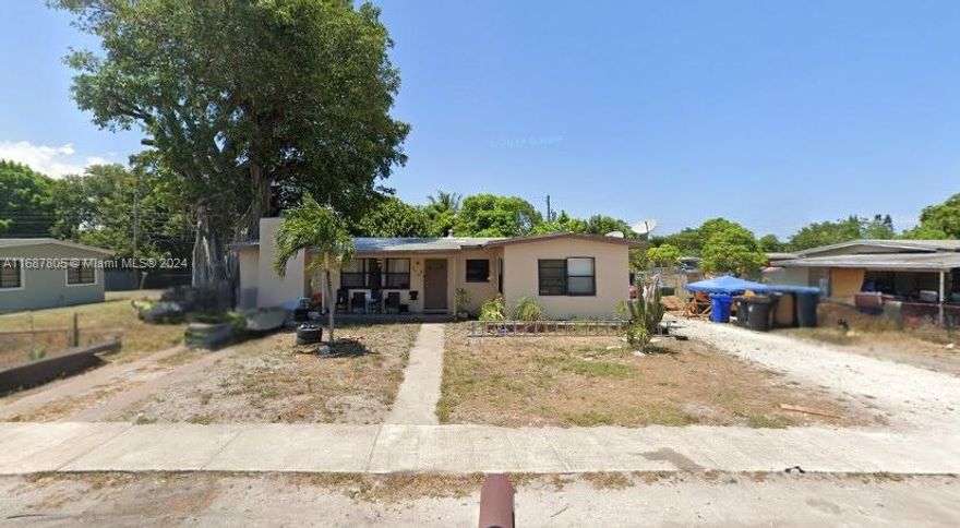 UNAPPROVED SHORT SALE. Single-story home located at 1001 NW 13th Ct, Fort Lauderdale, FL 33311. This property features a spacious front yard with a concrete walkway, mature trees, and plenty of space for outdoor enhancements. With a simple yet practical design, this home offers a cozy covered front porch area, ideal for enjoying the Florida weather. Positioned in a quiet neighborhood, it provides ample driveway parking space. Great investment opportunity or starter home with potential for updates and landscaping improvements. PLEASE CALL LISTING OFFICE FOR MORE INFORMATION - Do not disturb the Tenant!!!
