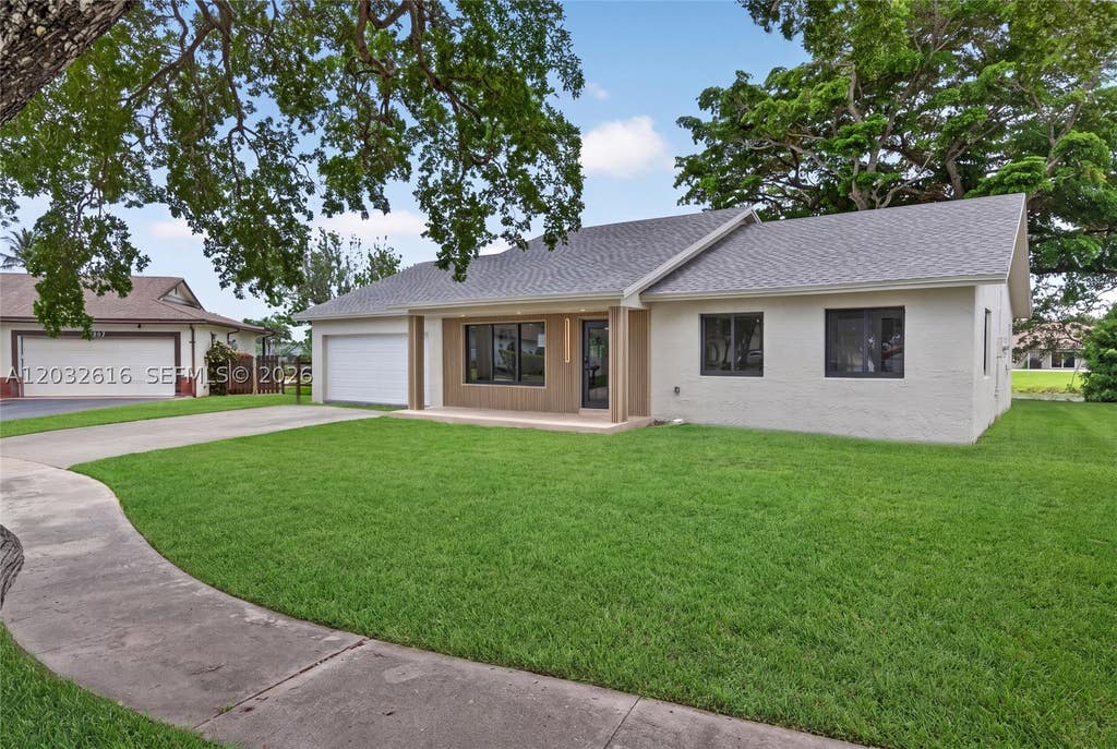 Photo of 8668 SW 50th St, Cooper City, FL 33328 (MLS # A12032616)