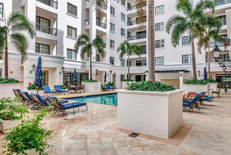 INVESTORS DREAM! - 1st floor 1/1 condo in Boca Grand, just steps from Mizner Park, beaches, shopping, and restaurants. Features include a modern kitchen with granite countertops and stainless steel appliances, new gray vinyl flooring, a walk-in closet, and a full-size washer/dryer. No neighbors on either side for extra privacy. Enjoy resort-style amenities: heated pool, fitness center, billiards room, 24-hour security, valet parking, and assigned garage parking near the elevator. Pet-friendly and allows rentals twice a year (90-day minimum). water heater - 2020,  AC - 2017. Perfect for homeowners or investors—don’t miss this opportunity to live in the heart of East Boca!