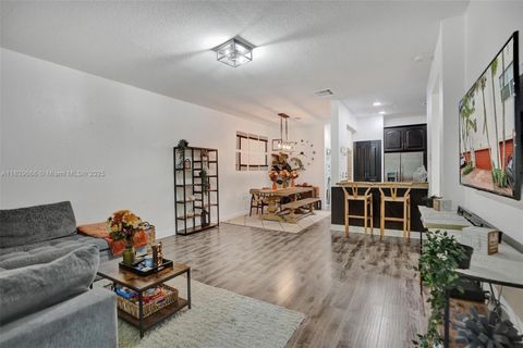 Photo of 11898 SW 25th Ct #103, Miramar, FL 33025 (MLS # A11829666)