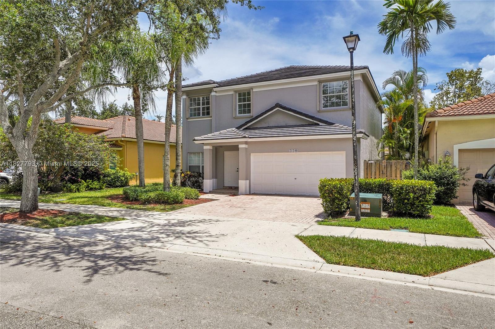 Complete 2025 renovation on this 4 bedroom 2.5 bath and 2 car garage home. This spacious property is Located in Emerald Estates in Weston. Large screened in deck and landscaped yard. 2025 Roof, Kitchen cabinets, appliances, bathrooms, floors, lighting, exterior and interior paint and so on. This gated community features a gym, pool and playground. This is a wonderful family friendly neighborhood with excellent A Rated schools.